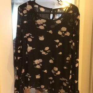 Sheer with tank beneath scoop neck floral blouse